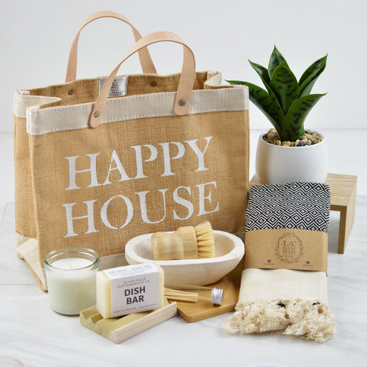 A cozy housewarming gift set with home essentials and décor. Ideal for housewarmings, client gifts, and gift basket dropshipping businesses.
